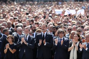 King Felipe of Spain and Prime Minister Mariano Rajoy observe a minute of silence in Placa de Catalunya, a day after a van crashed into pedestrians at Las Ramblas in Barcelona
