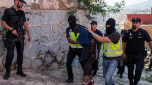 Spanish police arrest a man suspected of belonging to an Islamist militant cell that simulated decapitations in the Spanish north African enclave of Melilla